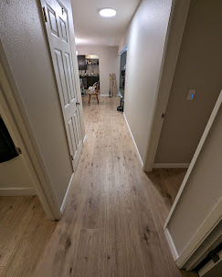 Hardwood flooring running down a hallway