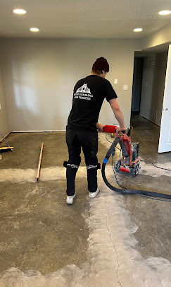 Sanding a hardwood floor during refinishing